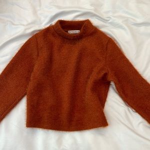Dark orange turtleneck
